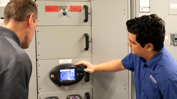 Hondo working on a smart meter